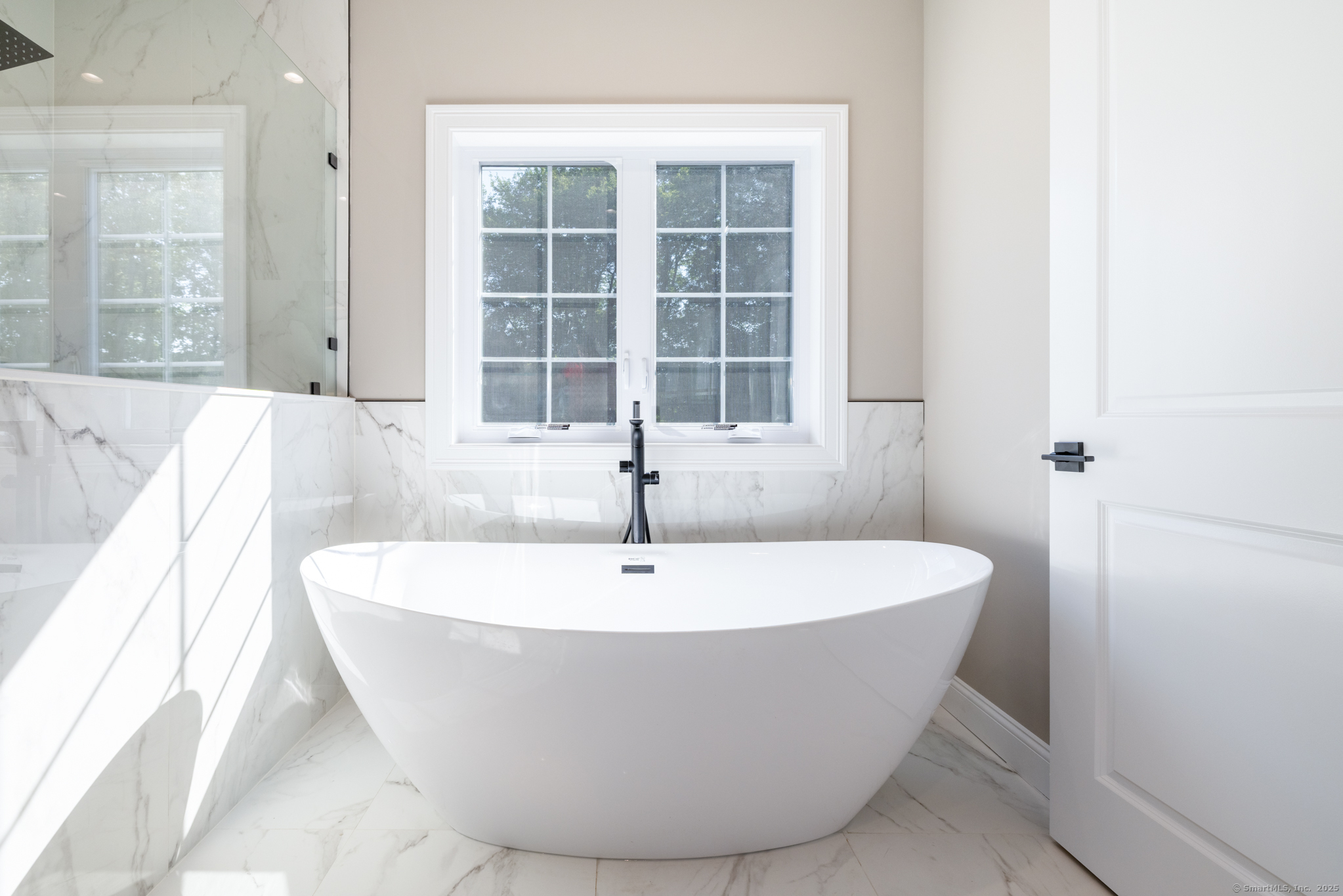 10 Maple View Trail Litchfield, CT 06759 - Photo 26 of 39 a white tub sitting next to a window