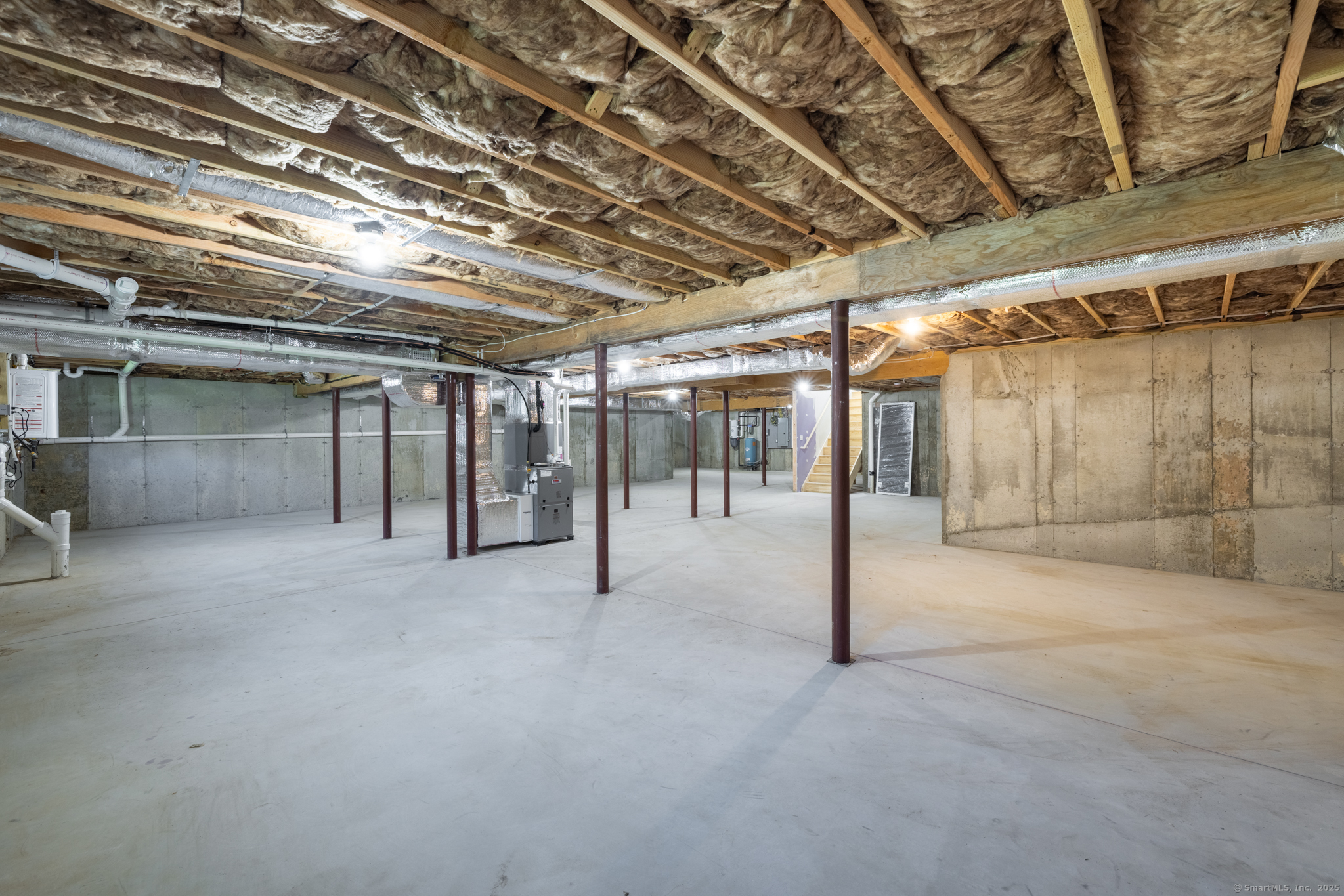 10 Maple View Trail Litchfield, CT 06759 - Photo 32 of 39 a view of empty room with wooden floor