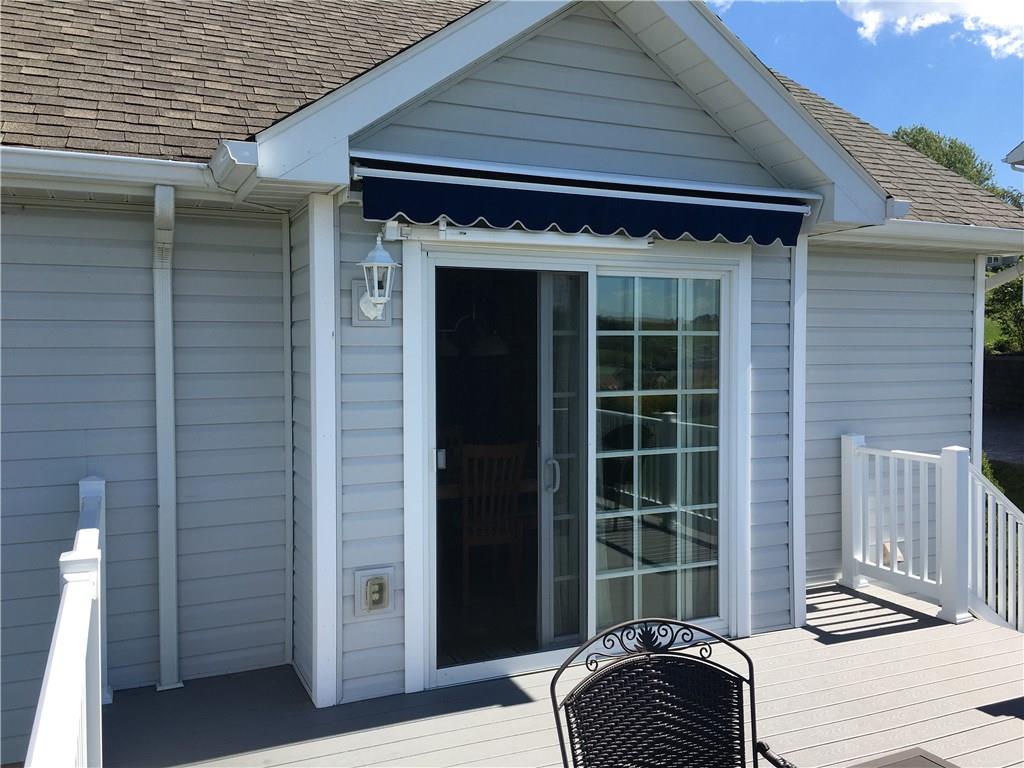 216 Grandma's Road Mount Pleasant, PA 15666 - Photo 3 of 25 Sliding French Doors w/screen leading to the Dining Room. Outdoor all weather electrical outlet makes listening to the Bucco's simple, plug in the radio and kick back, relax and enjoy the views.