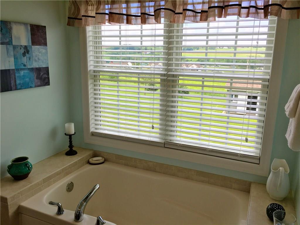 216 Grandma's Road Mount Pleasant, PA 15666 - Photo 24 of 25 To ease the aches and pain, or to simply relax - take in the deep soaking tub and unwind! The back windows are elevated and overlook the back yard so there is plenty of privacy.