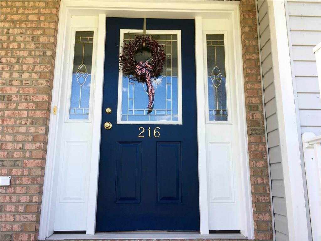 216 Grandma's Road Mount Pleasant, PA 15666 - Photo 6 of 25 Sometimes a Front Door can say a lot! The curb appeal is delightful and the comfort of this home will welcome you and your guests!
