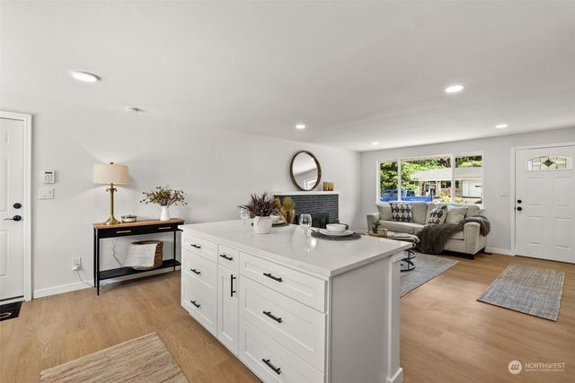 a view of living room with granite countertop furniture and a couch