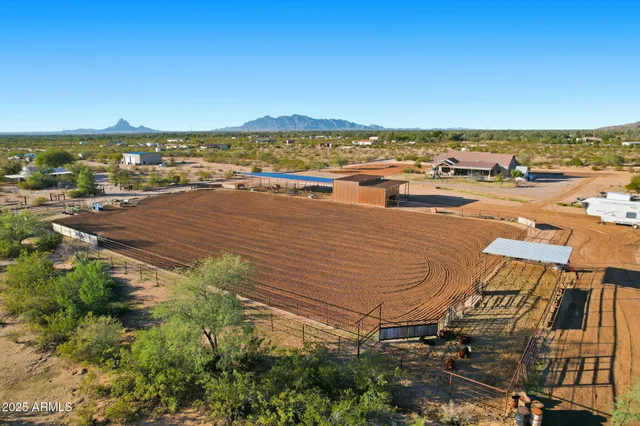 a living room with fireplace furniture and a flat screen tv