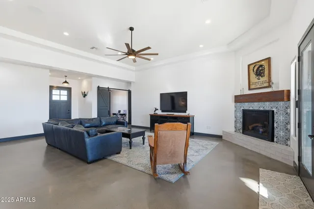 a kitchen with stainless steel appliances granite countertop a stove and a microwave