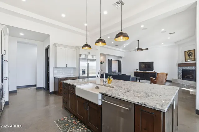 a bedroom with a bed and a bookshelf