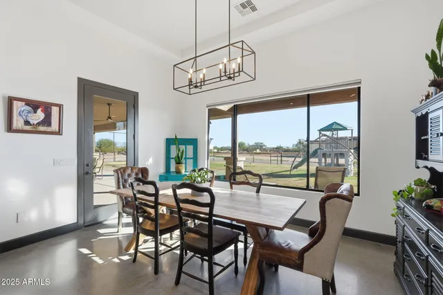 a bathroom with a double vanity sink mirror and shower