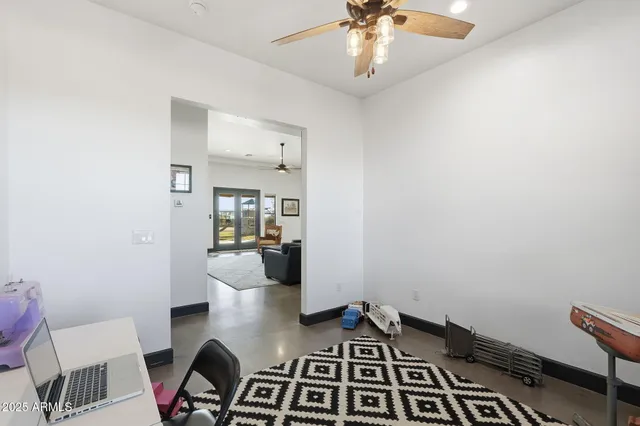 a bathroom with a tub and window