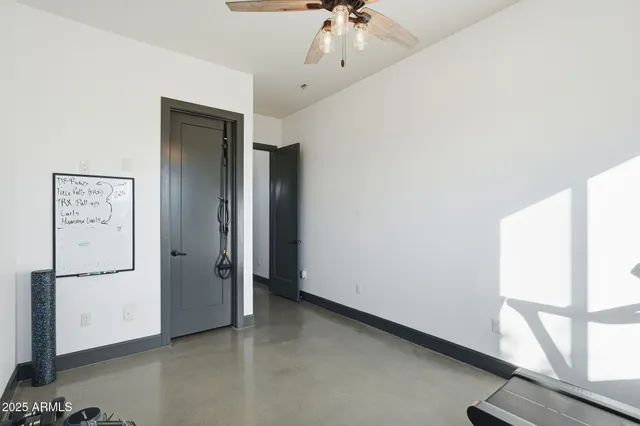 a bathroom with a granite countertop double vanity sinks and a mirror