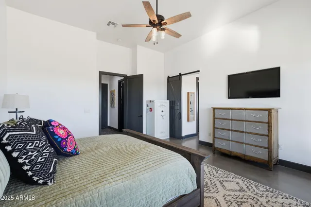 a view of swimming pool with chairs and lounge chair