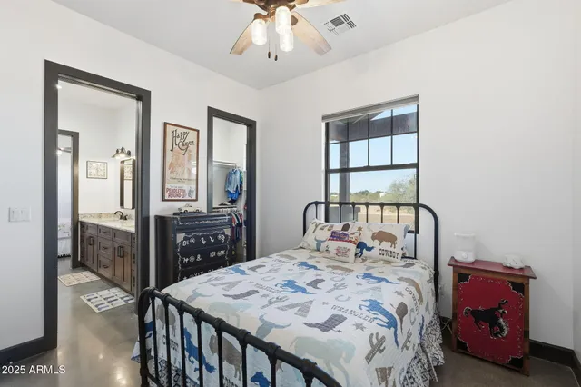 a view of a patio with a table and chairs