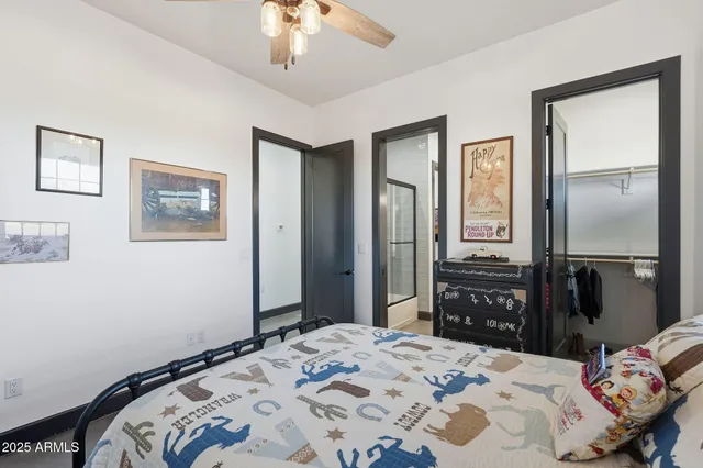 a view of a roof deck with couches and wooden floor