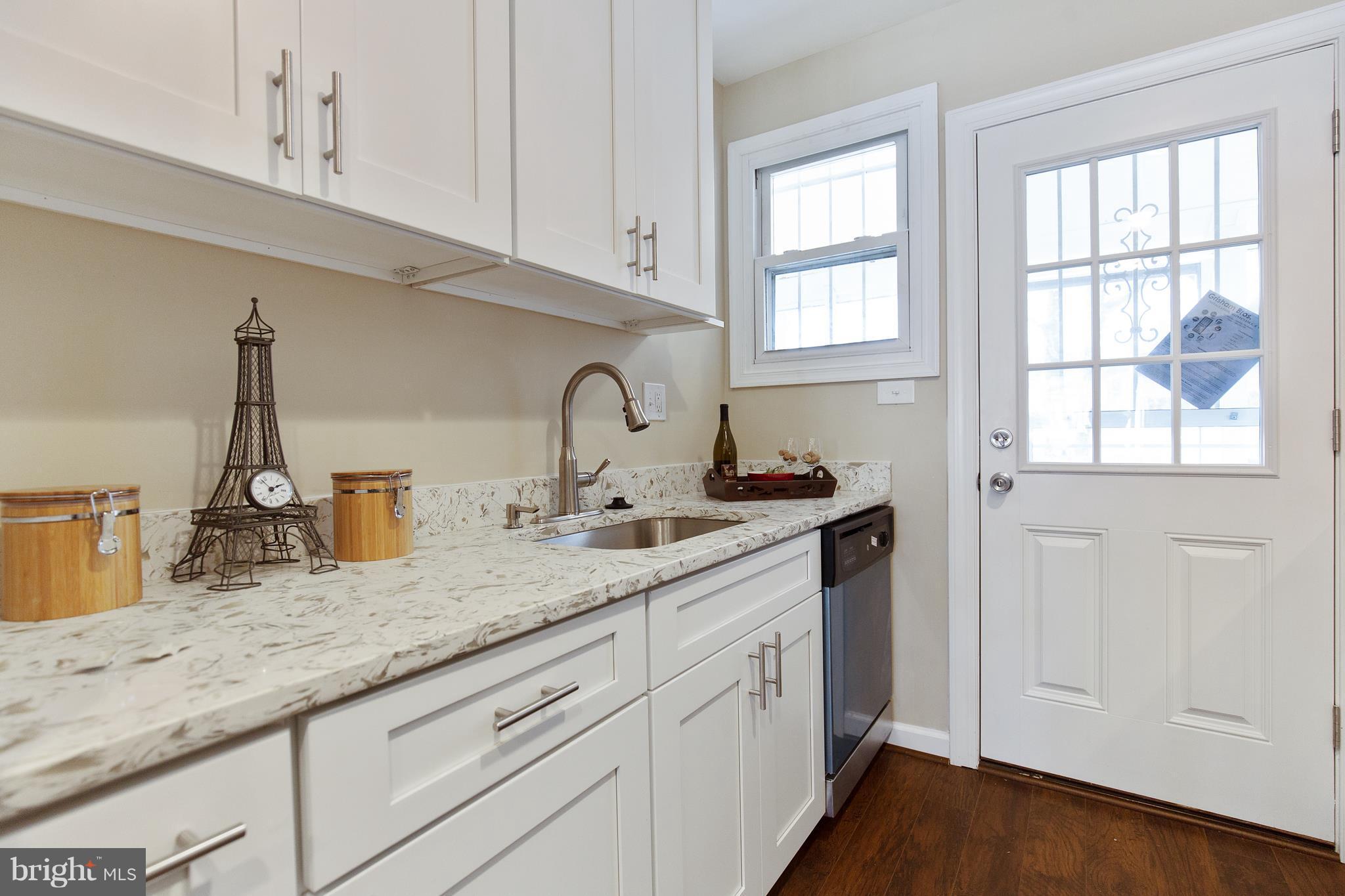 7700 Muncy Road Landover, MD 20785 - Photo 12 of 29 a kitchen with sink and window