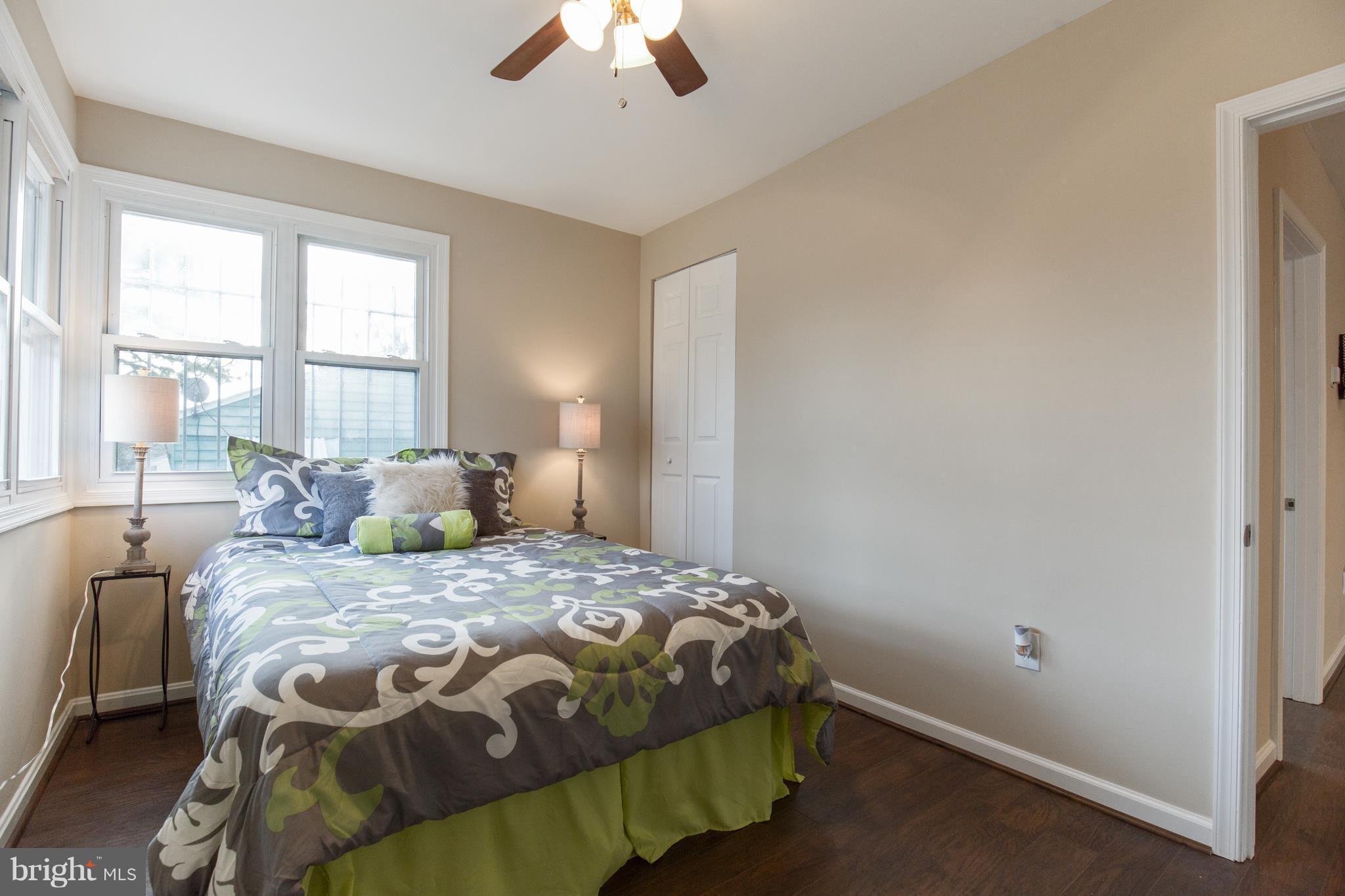 7700 Muncy Road Landover, MD 20785 - Photo 16 of 29 a bedroom with a bed and a window