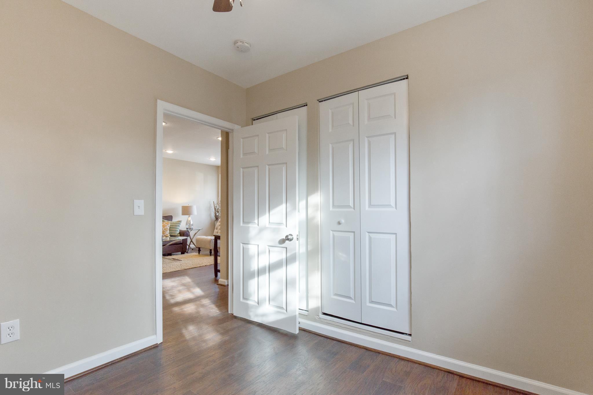 7700 Muncy Road Landover, MD 20785 - Photo 19 of 29 wooden floor with white walls