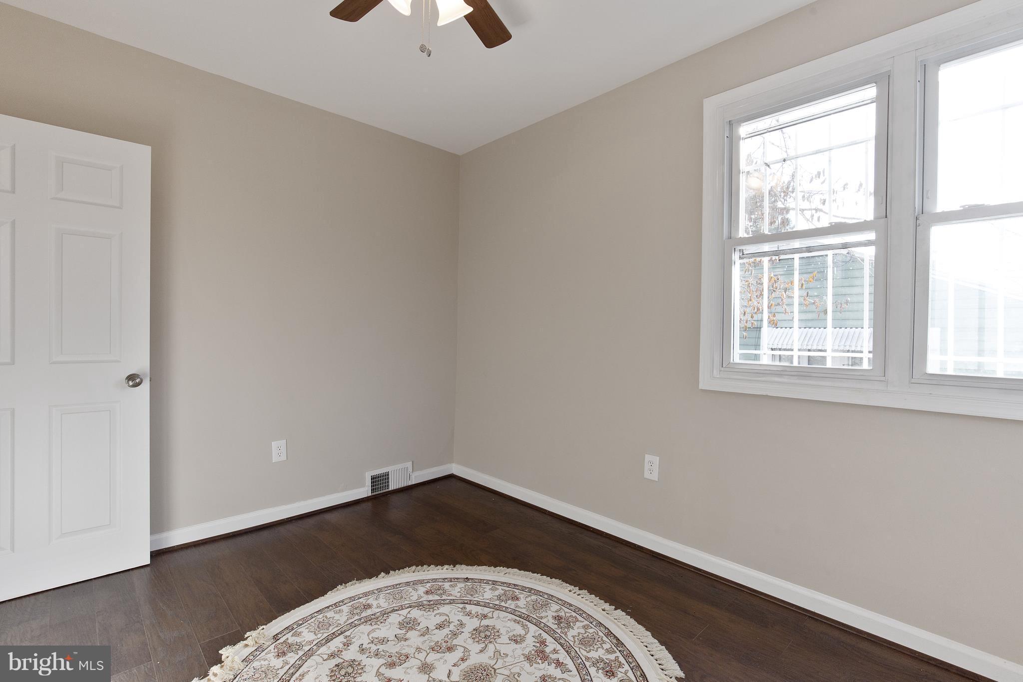 7700 Muncy Road Landover, MD 20785 - Photo 21 of 29 an empty room with a workspace