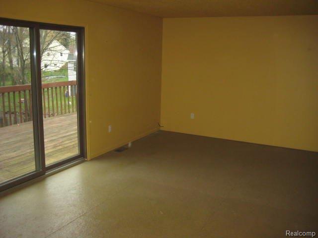 720 Academy Road Holly, MI 48442 - Photo 9 of 25 261-956067 - Family Room - Dini