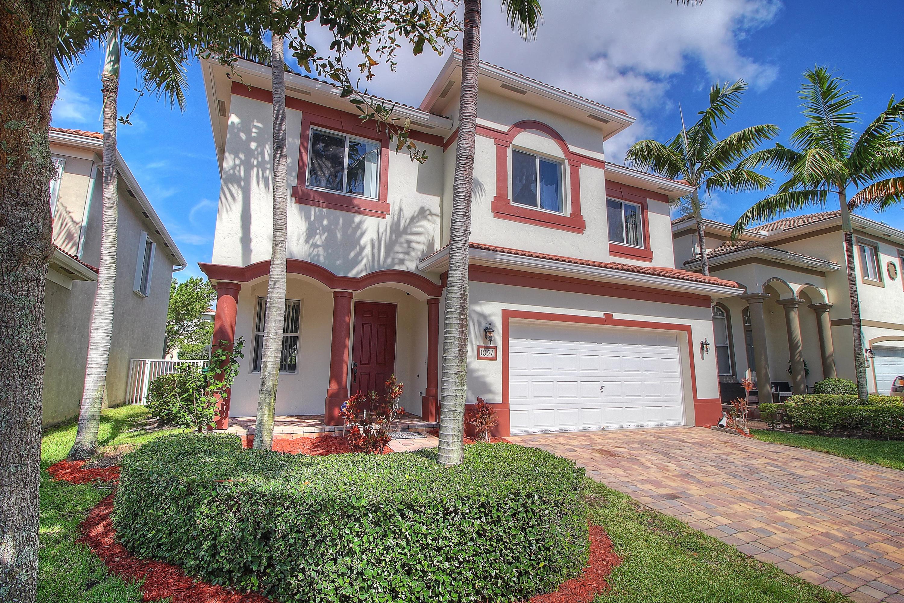 1057 Center Stone Lane Riviera Beach, FL 33404 - Photo 3 of 38 House Front 3 MLS