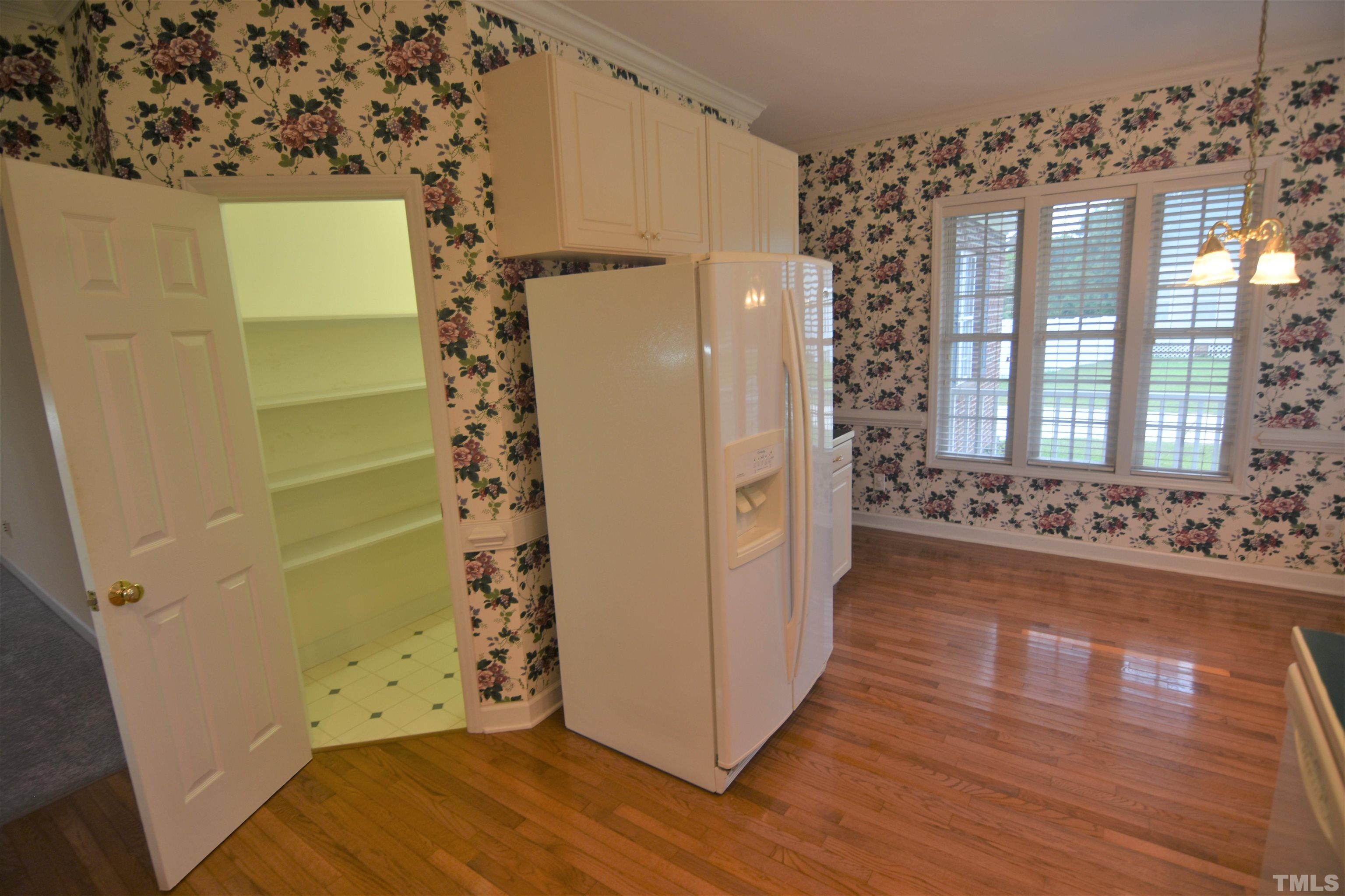 1025 Red Brick Road Garner, NC 27529 - Photo 15 of 30 a view of an entryway with wooden floor
