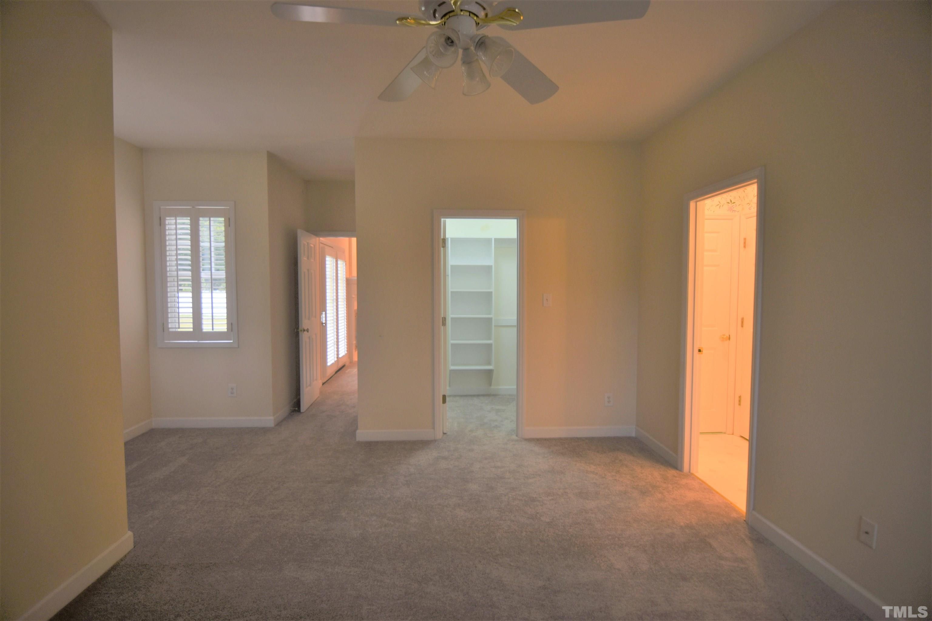 1025 Red Brick Road Garner, NC 27529 - Photo 18 of 30 a view of an empty room with a window