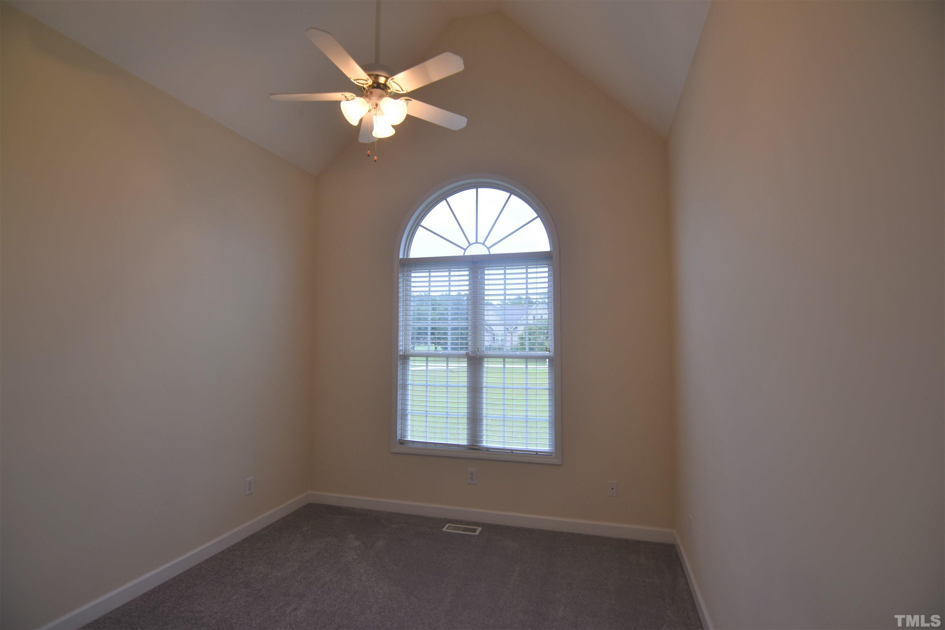1025 Red Brick Road Garner, NC 27529 - Photo 23 of 30 an empty room with a window