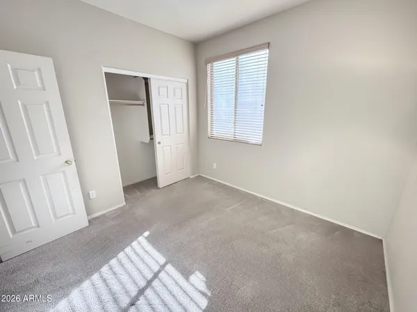 a view of empty room with windows