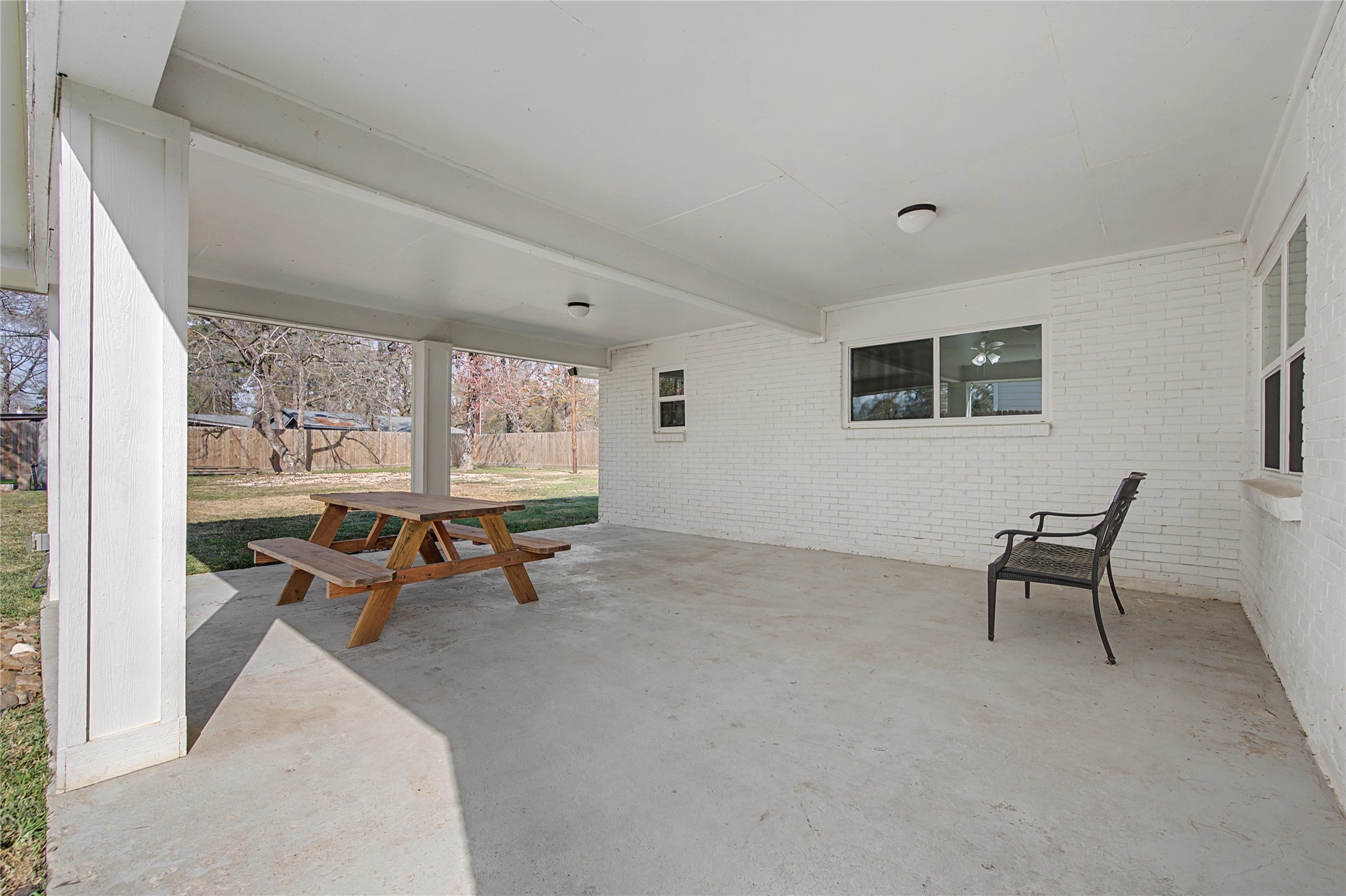 1719 Eastvale Drive Spring, TX 77386 - Photo 26 of 34 The large covered patio extends your living space outdoors.