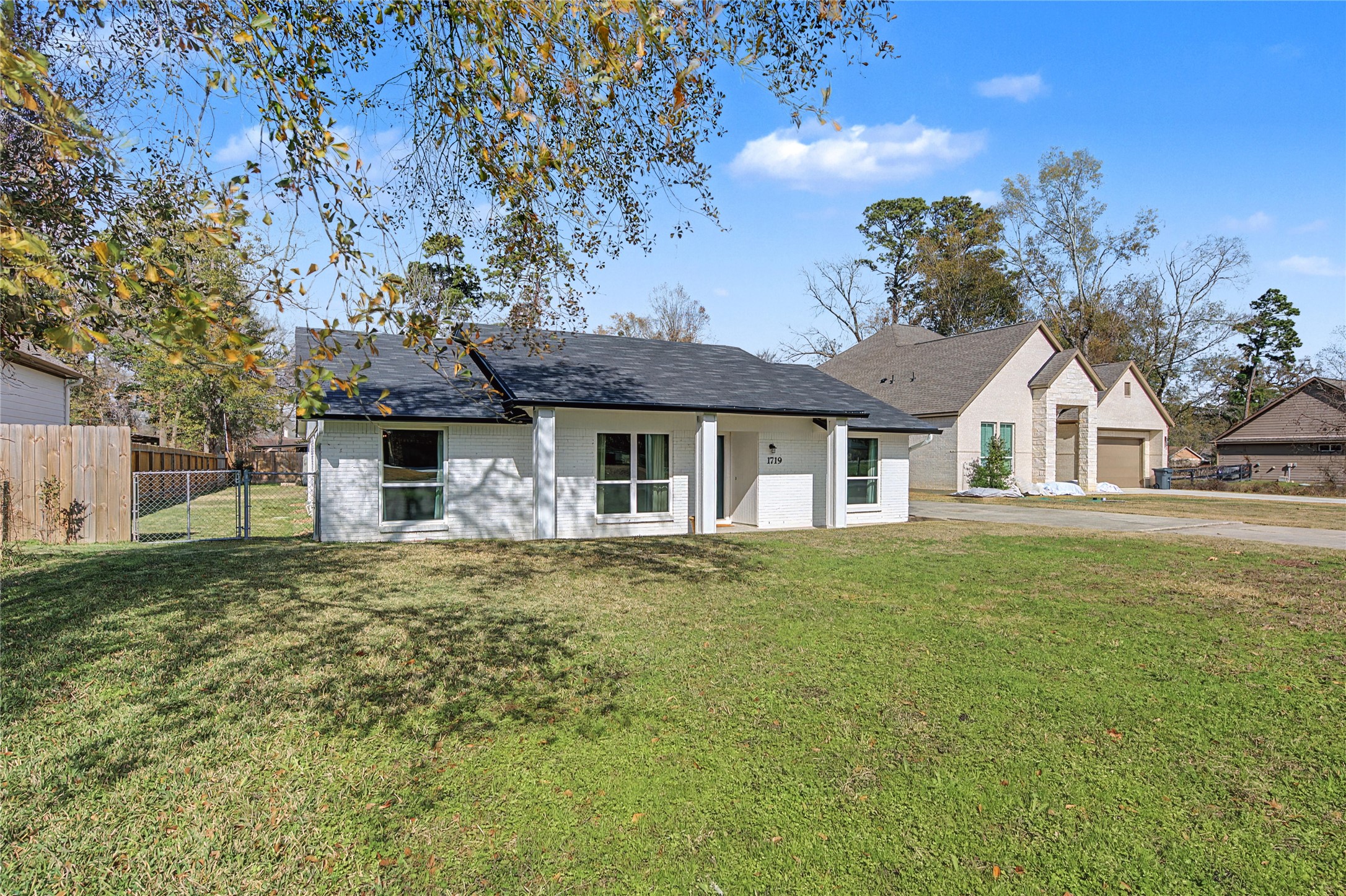 1719 Eastvale Drive Spring, TX 77386 - Photo 3 of 34 Welcome to 1719 Eastvale Drive. Located minutes from The Woodlands, this 4-bedroom, 2.5-bath home sits on nearly 1/3 of an acre in the quiet, unrestricted neighborhood of Spring Hills North. No HOA restrictions provide you the flexibility for a home-based business, workshop, trailer, boat, etc.