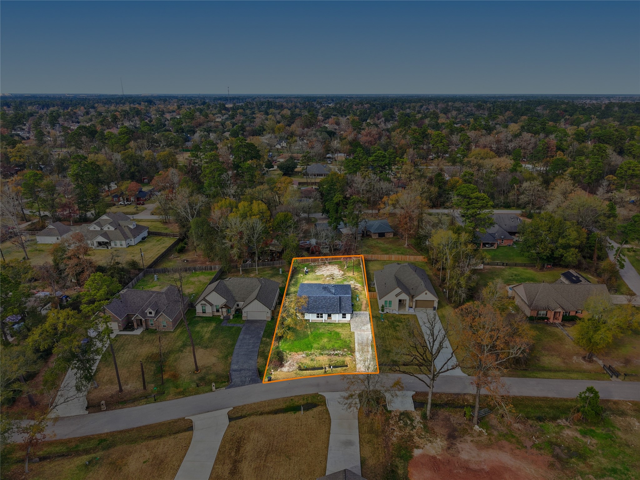 1719 Eastvale Drive Spring, TX 77386 - Photo 31 of 34 Located minutes from The Woodlands, yet tucked away on a generous lot, this property delivers the best of both worlds: freedom, space, and proximity. This 4-bedroom, 2.5-bath home sits on nearly 1/3 of an acre in the quiet, unrestricted neighborhood of Spring Hills North. No HOA restrictions provide you the flexibility for a home-based business, workshop, trailer, boat, etc.