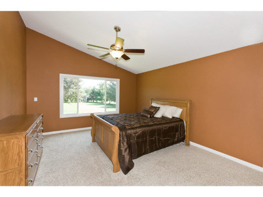 4283 Waltham Road Roscoe, IL 61073 - Photo 8 of 11 a bed room with furniture and window