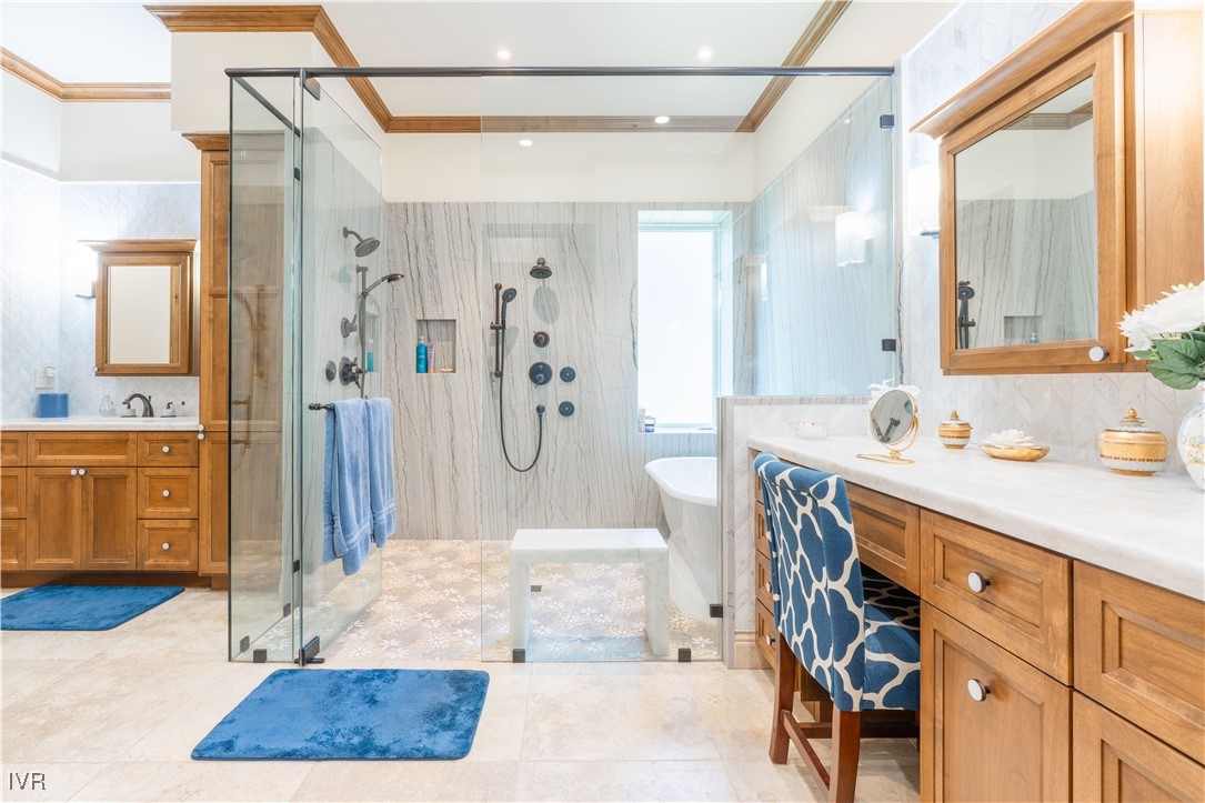 250 Pine Cone Road Incline Village, NV 89451 - Photo 24 of 50 a bathroom with a tub sink and mirror