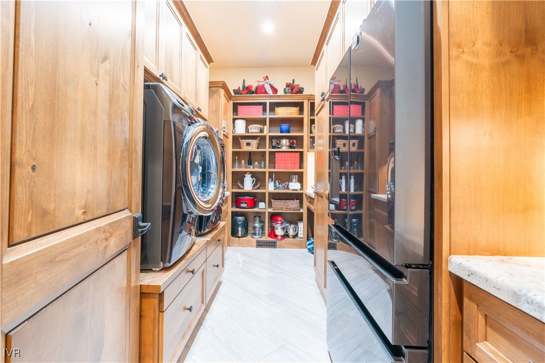 250 Pine Cone Road Incline Village, NV 89451 - Photo 28 of 50 a utility room with dryer and washer