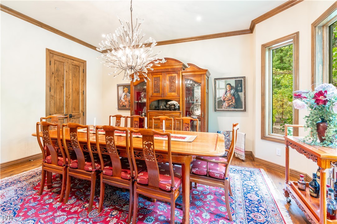 250 Pine Cone Road Incline Village, NV 89451 - Photo 30 of 50 a dining room with furniture a chandelier and window
