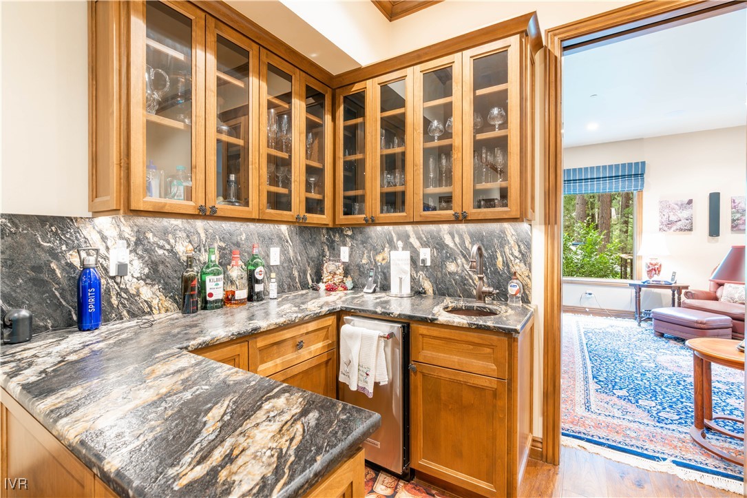 250 Pine Cone Road Incline Village, NV 89451 - Photo 40 of 50 a view of a kitchen with granite countertop a sink and a refrigerator