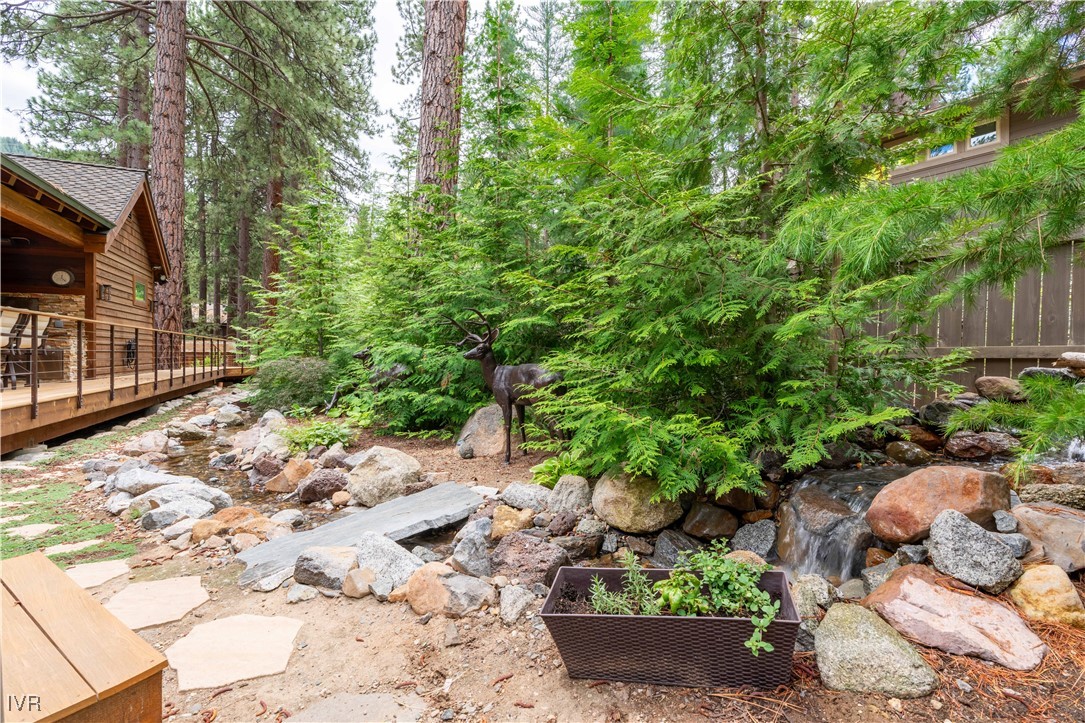 250 Pine Cone Road Incline Village, NV 89451 - Photo 49 of 50 a backyard of a house with lots of green space
