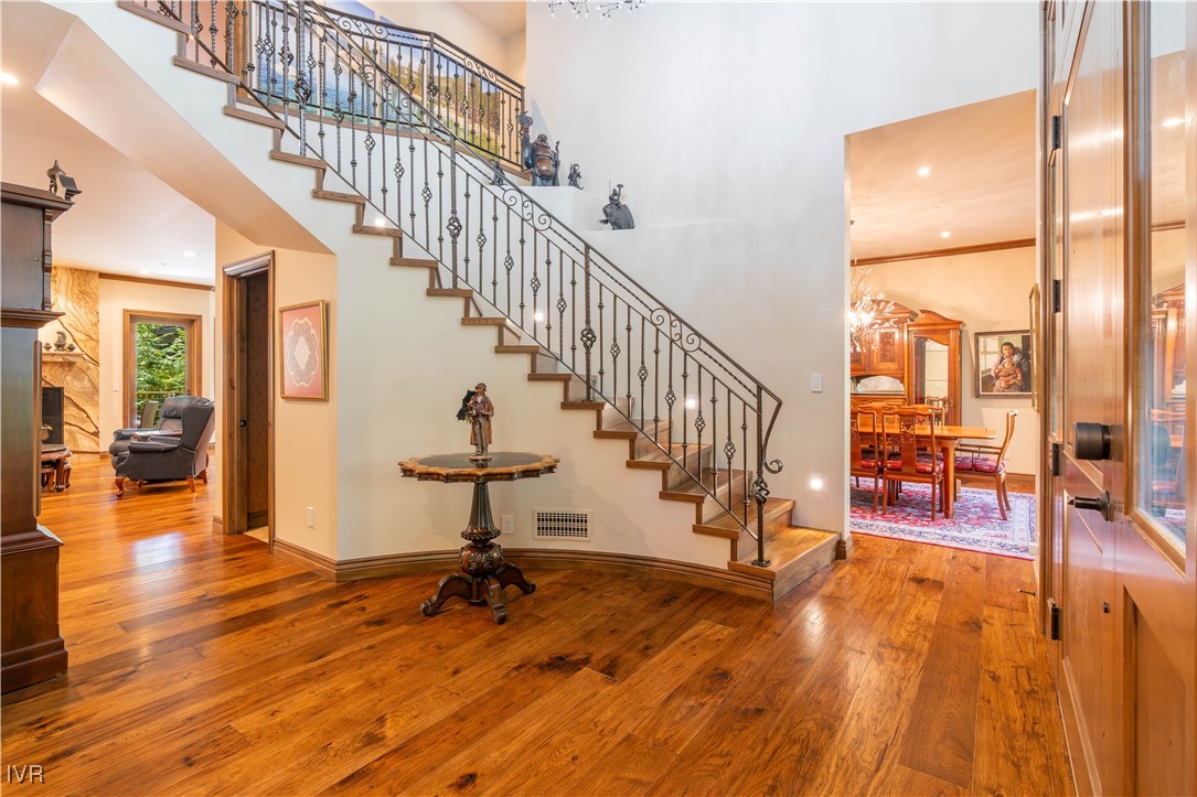 250 Pine Cone Road Incline Village, NV 89451 - Photo 8 of 50 a view of an entryway with wooden floor and door