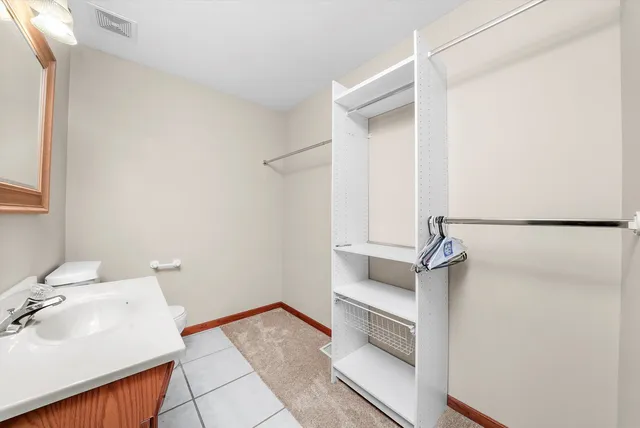 a bathroom with a sink and shower