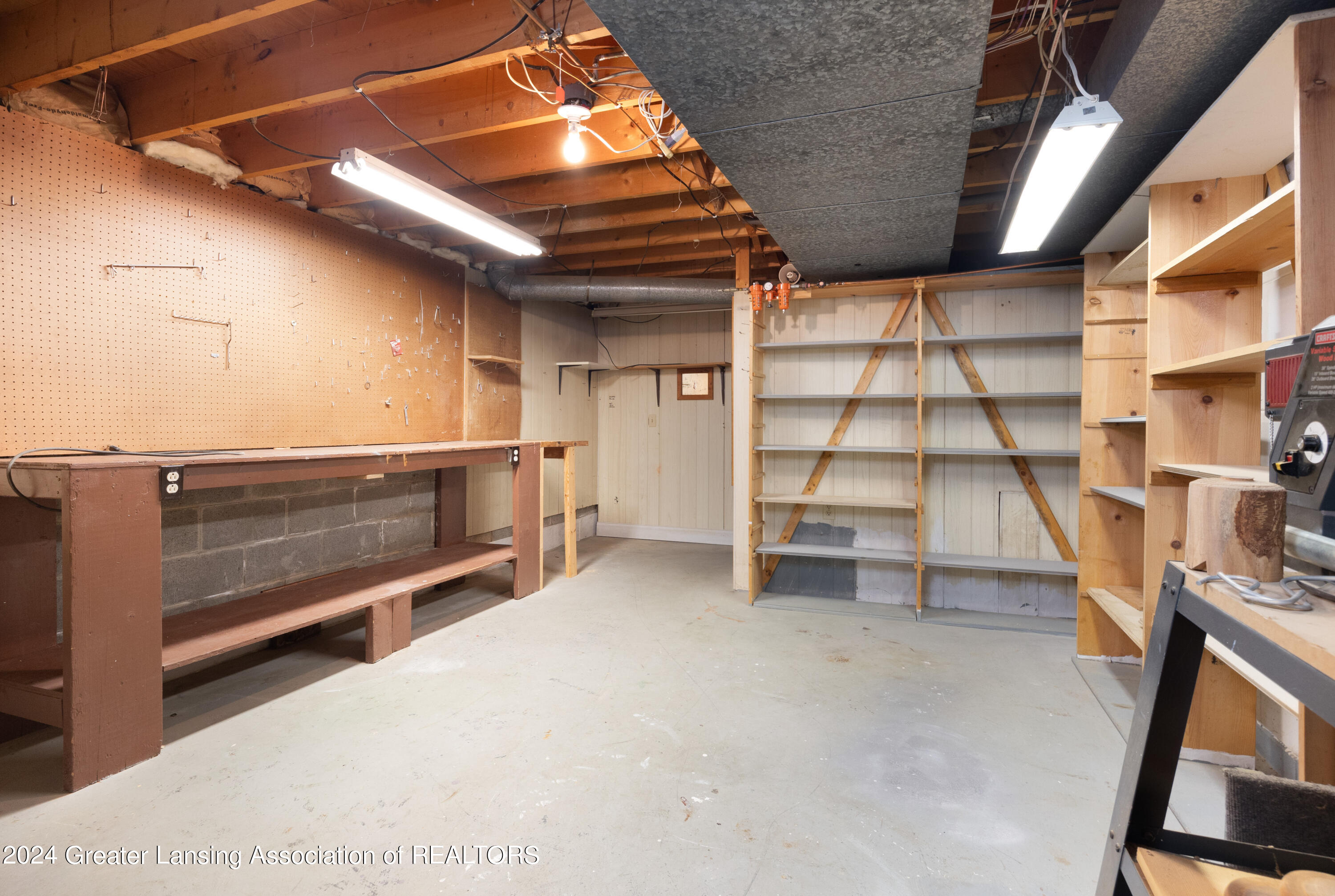 2061 College Road Holt, MI 48842 - Photo 25 of 32 Store Room - Basement