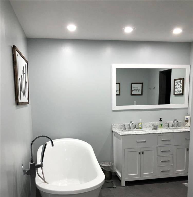 763 Oneida Valley Road Butler, PA 16001 - Photo 12 of 24 a bathroom with a toilet sink and mirror