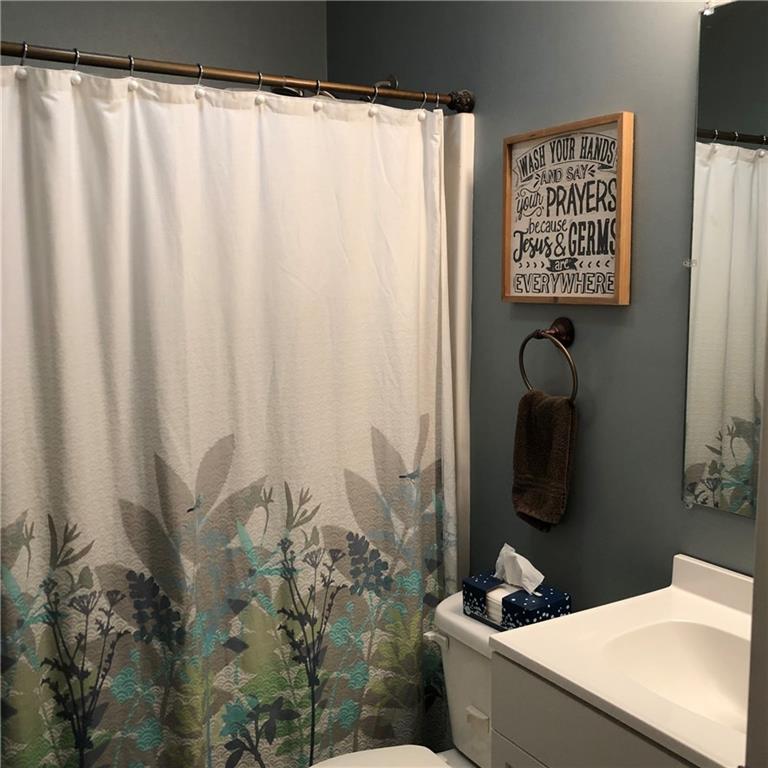 763 Oneida Valley Road Butler, PA 16001 - Photo 18 of 24 a bathroom with a shower curtain and sink