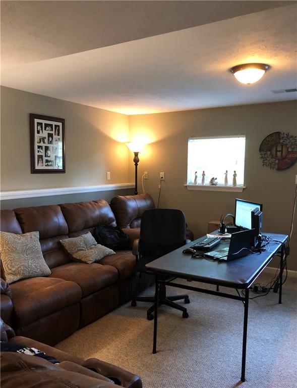 763 Oneida Valley Road Butler, PA 16001 - Photo 19 of 24 a living room with furniture and a night stand