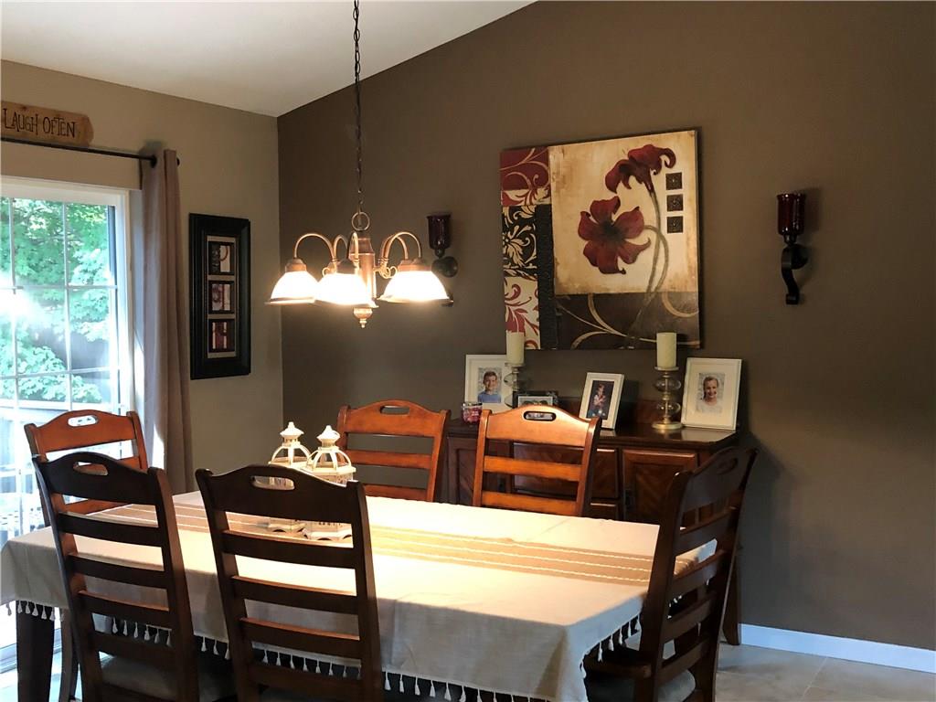 763 Oneida Valley Road Butler, PA 16001 - Photo 8 of 24 a outdoor dining space with furniture and chandelier