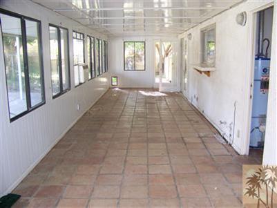 68431 Rodeo Road Cathedral City, CA 92234 - Photo 6 of 6 a view of hallway with windows