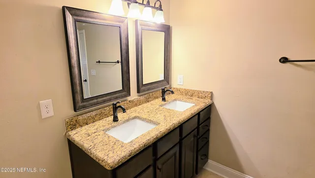 a bathroom with a toilet and shower