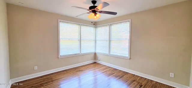 a bathroom with a sink vanity and a mirror