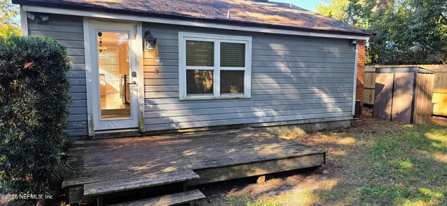 a view of swimming pool with yard