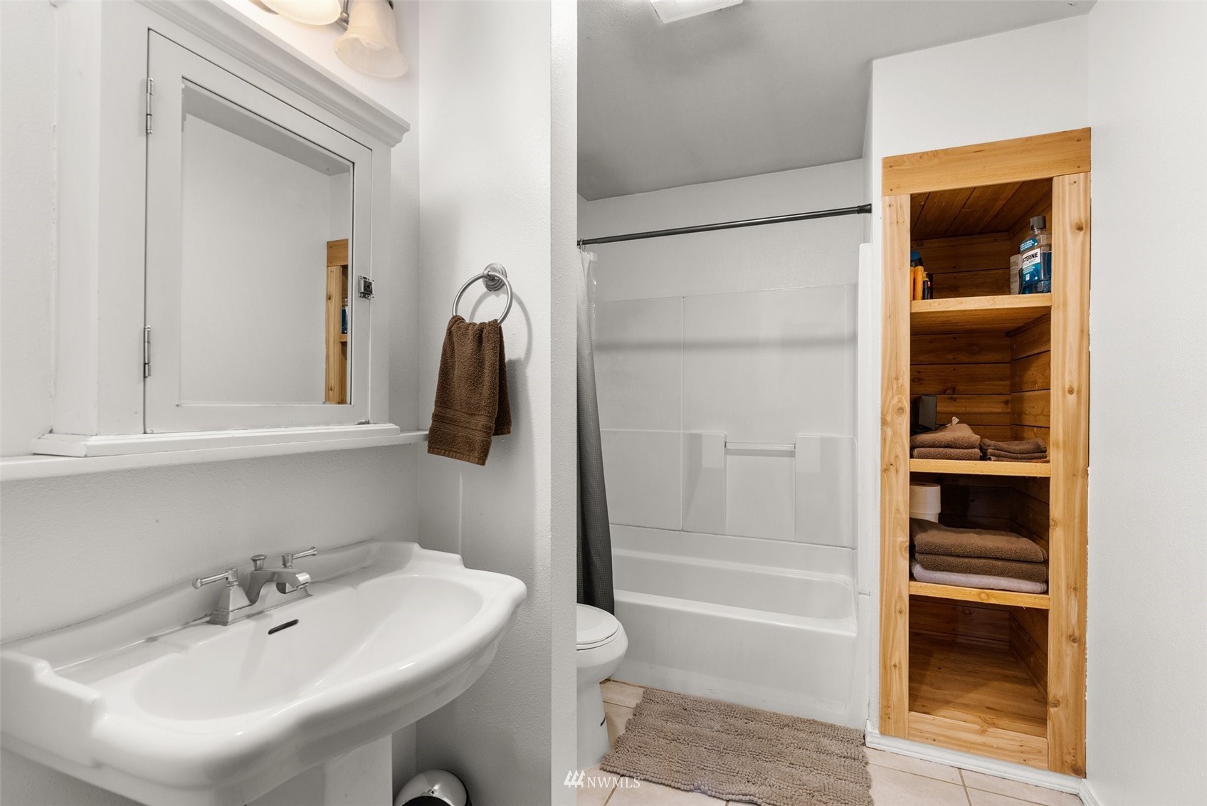 916 Southeast Korpi Way Winlock, WA 98596 - Photo 17 of 31 a bathroom with a sink and a mirror