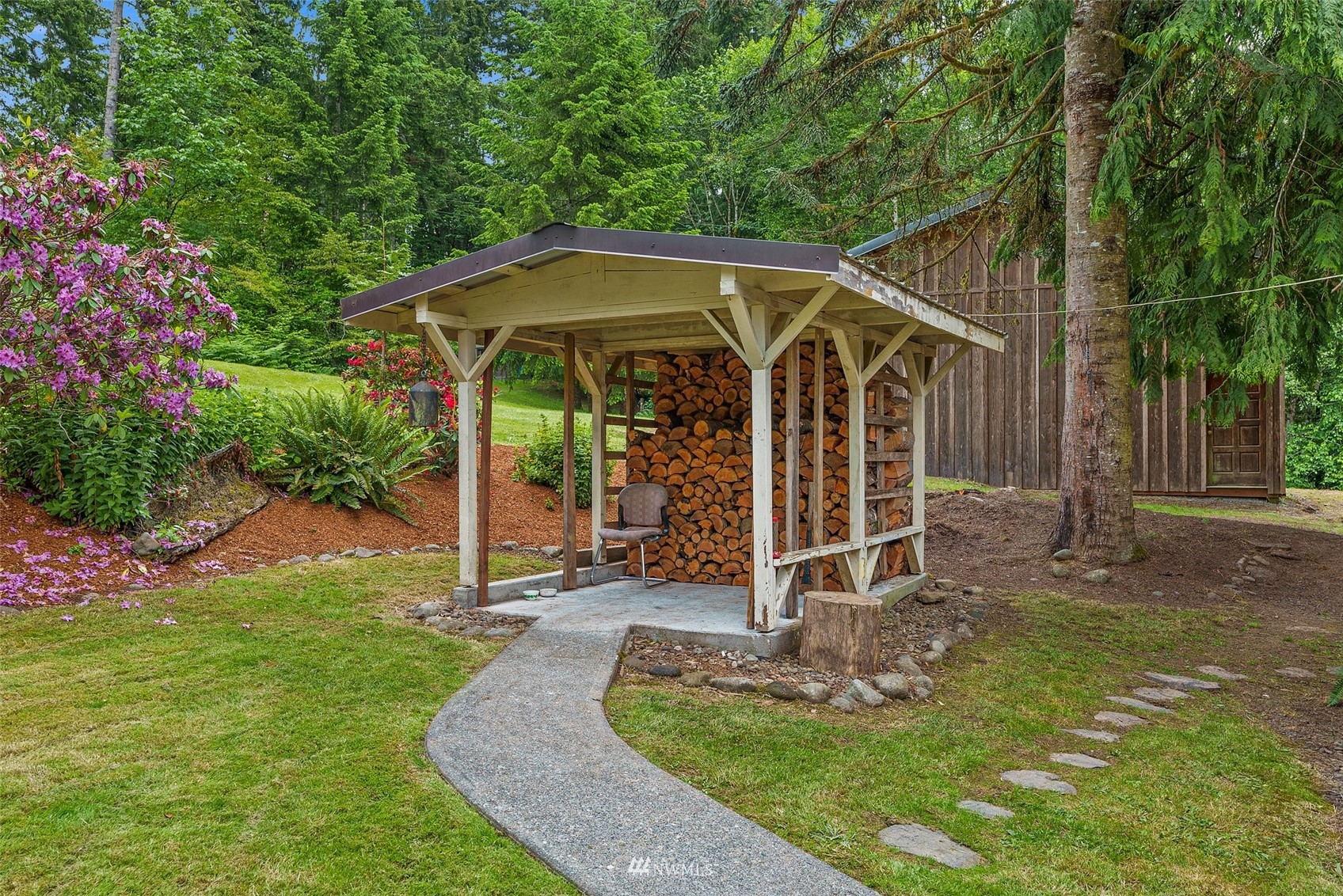 916 Southeast Korpi Way Winlock, WA 98596 - Photo 22 of 31 a view of a chair and table in the yard