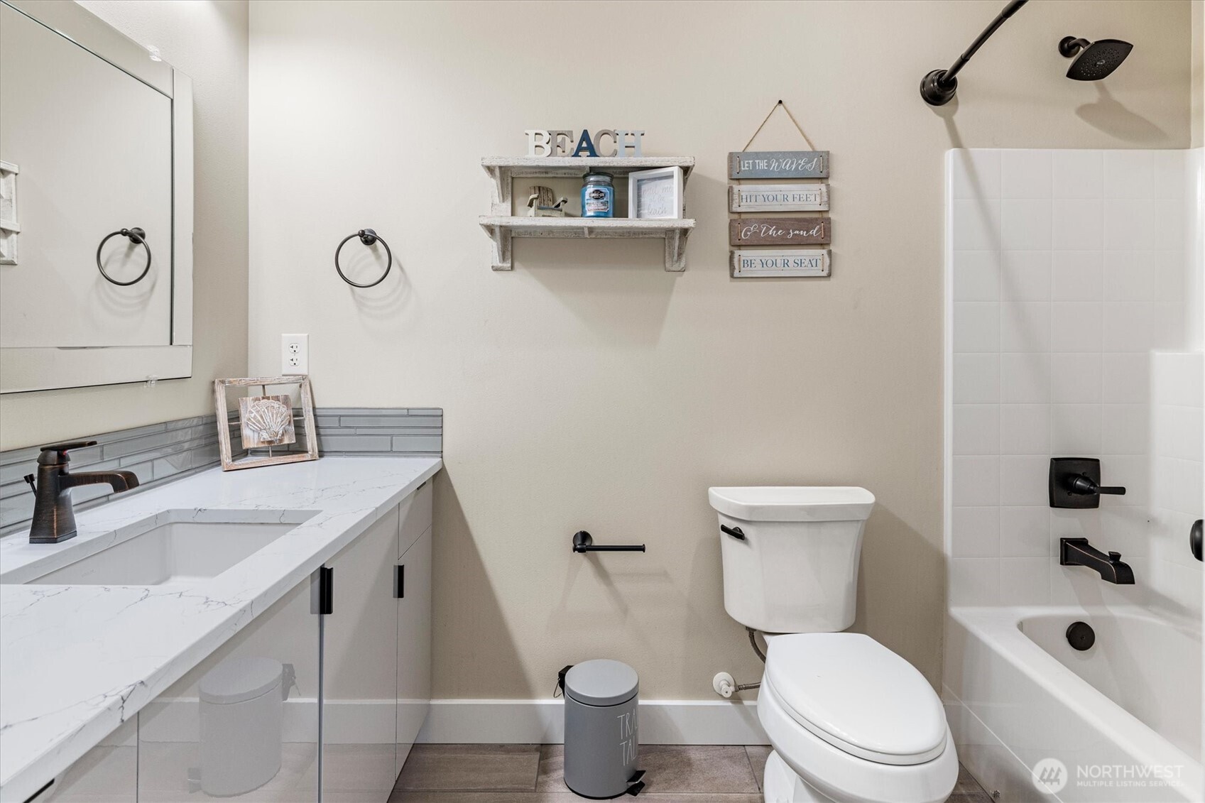 20025 Southeast 232nd Street Maple Valley, WA 98038 - Photo 22 of 40 a bathroom with a sink a toilet and shower