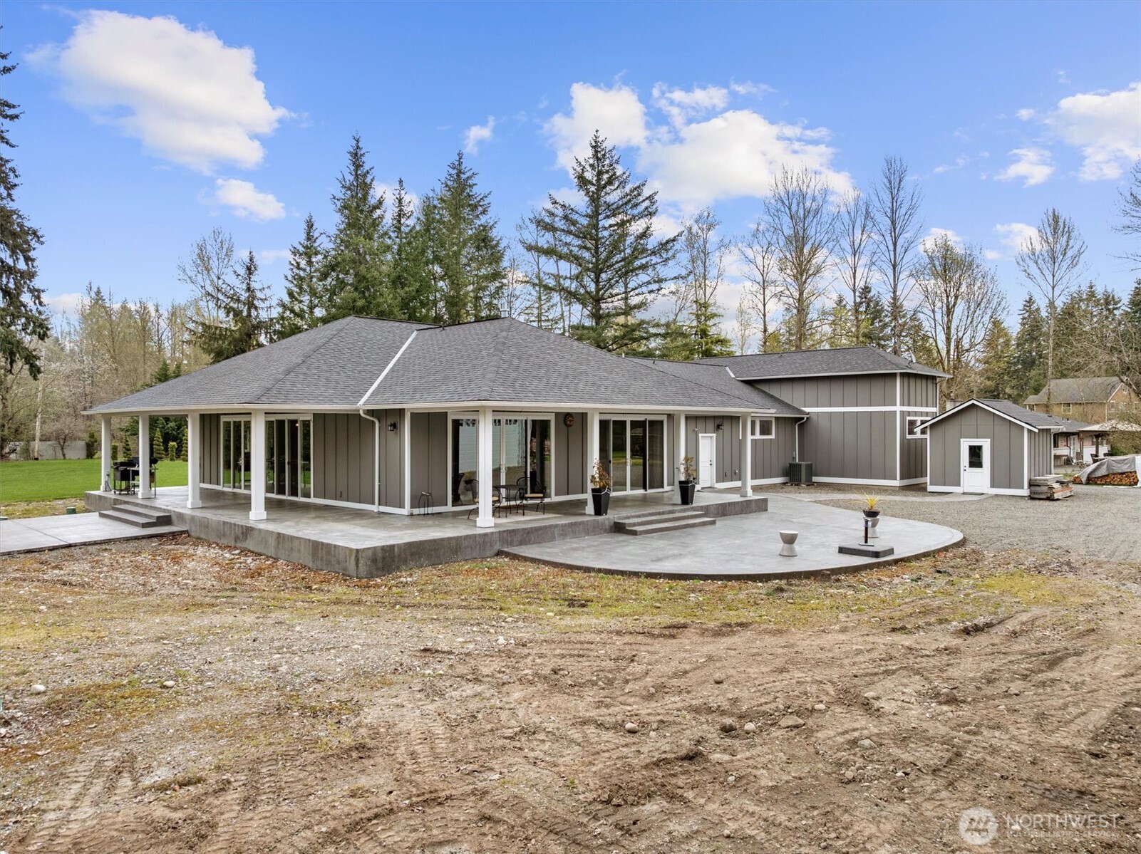 20025 Southeast 232nd Street Maple Valley, WA 98038 - Photo 33 of 40 a front view of a house with garden