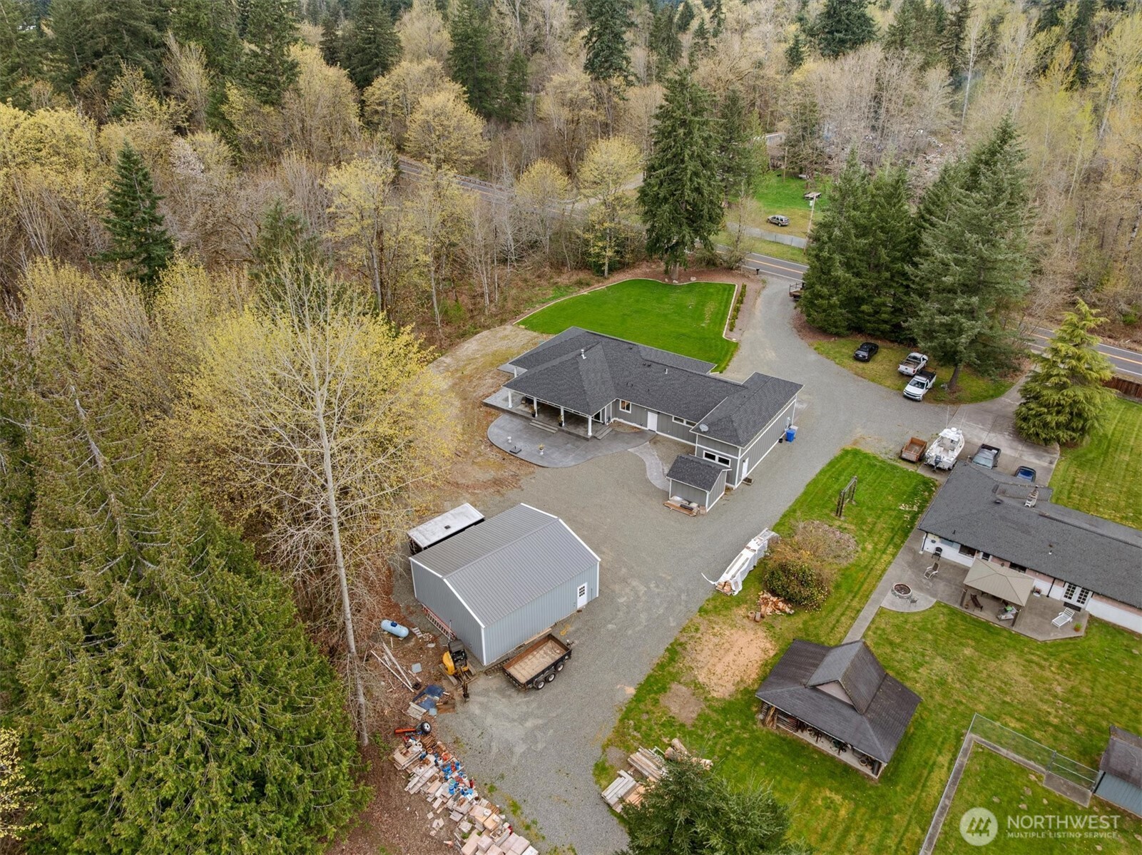 20025 Southeast 232nd Street Maple Valley, WA 98038 - Photo 39 of 40 an aerial view of a house with a swimming pool